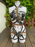 harnais en sequin or et noir avec perles